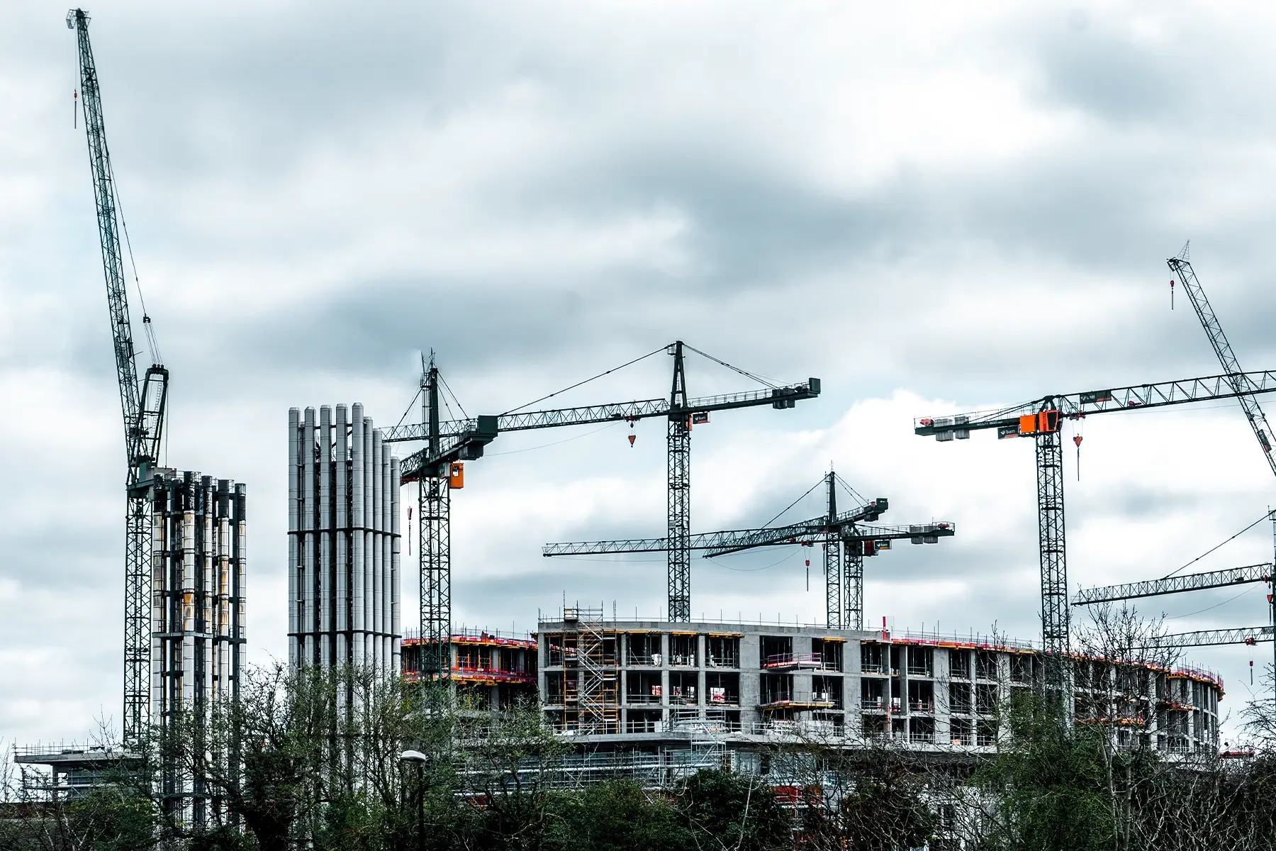 Exterior view of the hospital site showing multiple tower cranes protecting the construction site where WES3 New Children's Hospital Ireland is keeping staff safe.