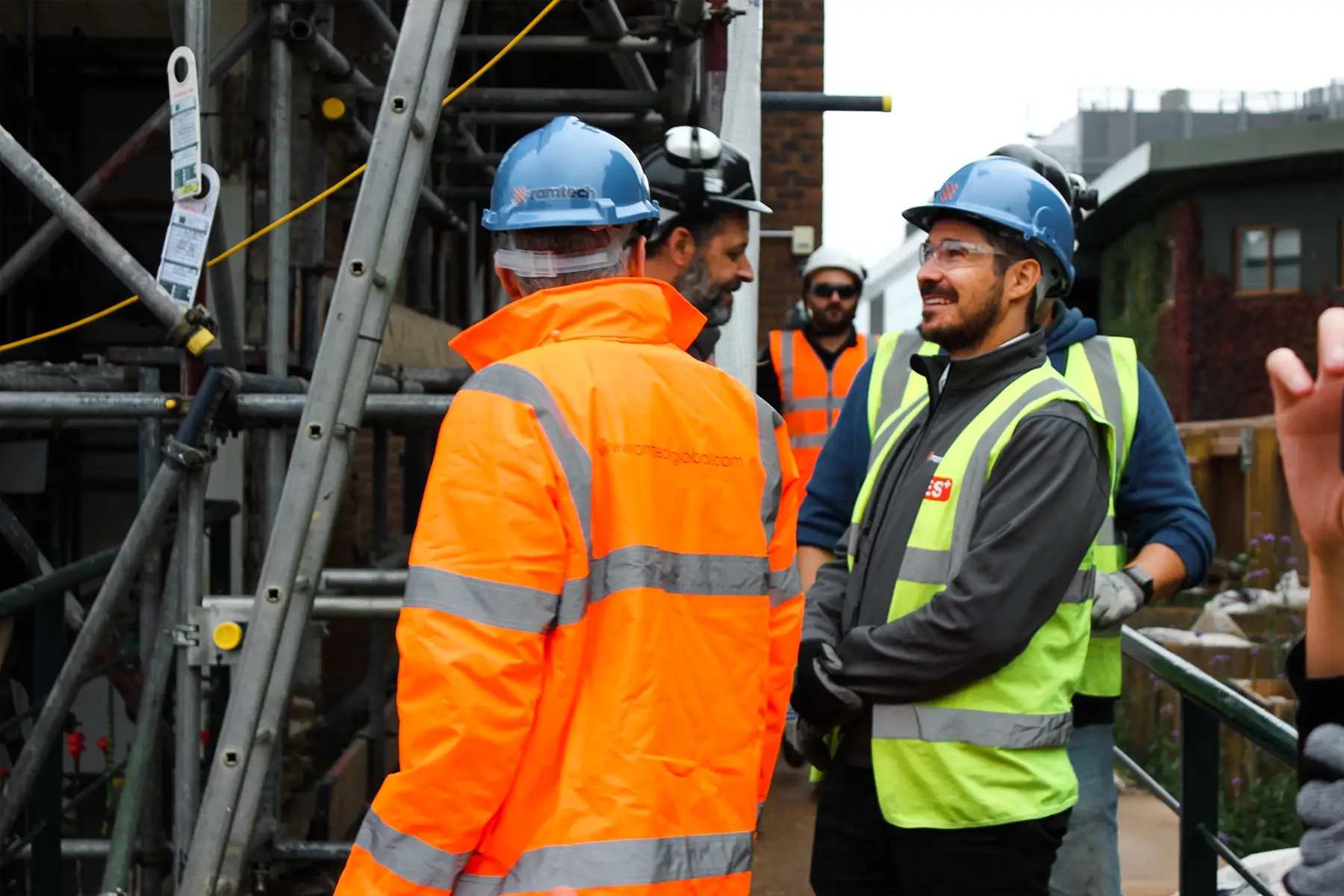 Team meeting regarding Wimbledon construction fire safety.