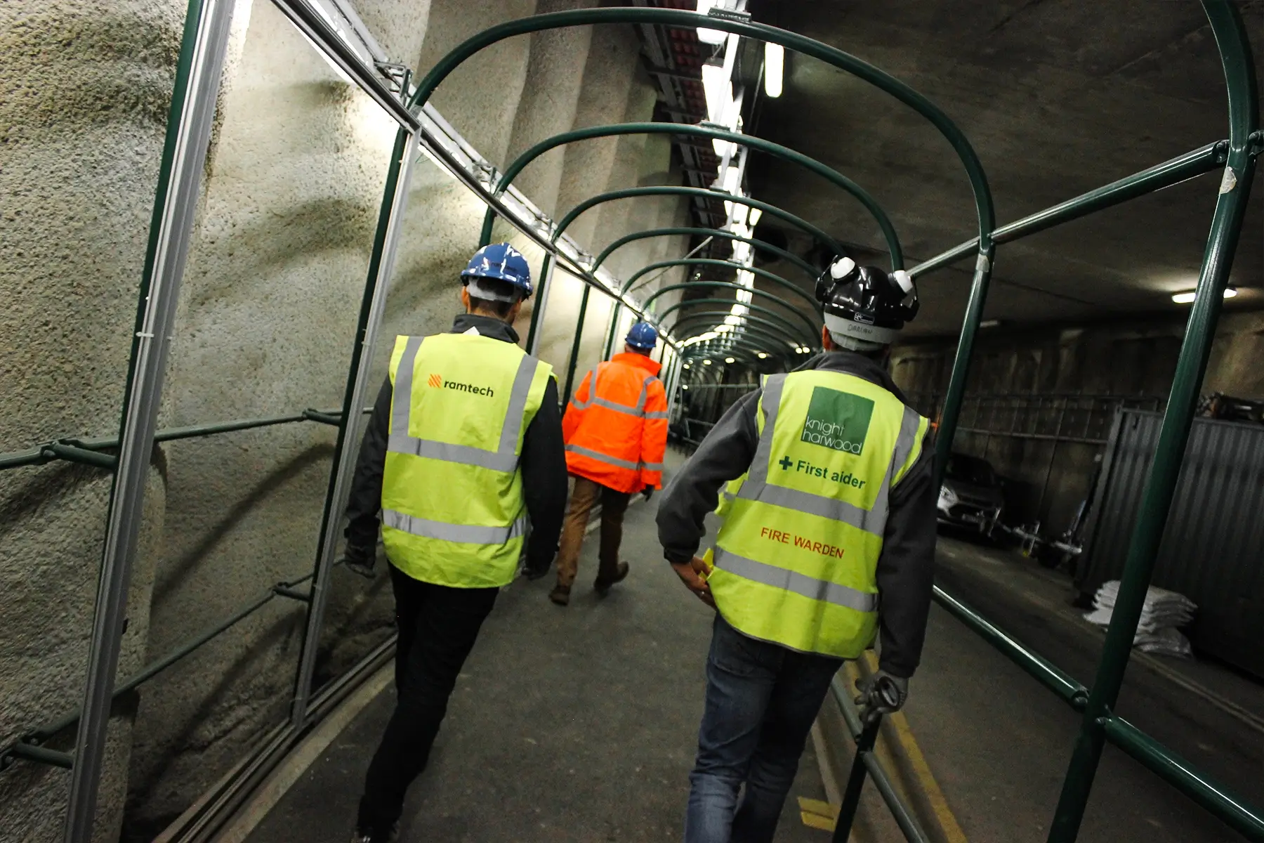 Fire wardens overseeing Wimbledon construction fire safety.